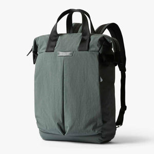 Bellroy green tote backpack with black carry handles and shoulder straps