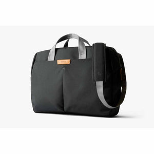Black Bellroy briefcase with grey handles and shoulder strap