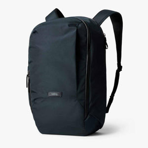 Bellroy navy blue backpack with vertical zipper and brand logo patch