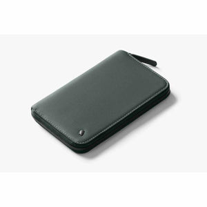 Bellroy zip wallet in dark grey leather with owl logo