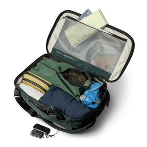 Open Bellroy Venture travel bag packed with clothing and accessories