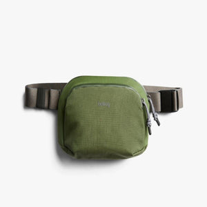 Bellroy olive green sling bag with adjustable strap and front zipper