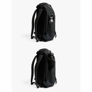 Bellroy black backpack showing side pocket with water bottle