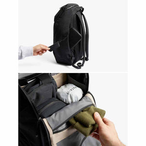Bellroy backpack showing side pocket access and internal storage compartments with packed items