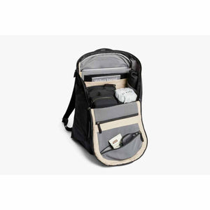 Open Bellroy backpack showing internal organization with laptop sleeve and storage pockets