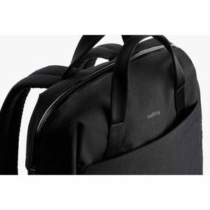 Close up of black Bellroy backpack showing top handles and zipper detail