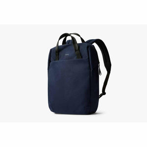 Bellroy navy blue backpack with top carry handles and shoulder straps
