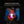 Child sitting in a blue camping chair holding a glowing BioLite AlpenGlow 250 lantern