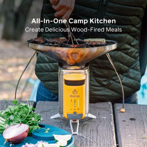BioLite wood burning camp stove cooking meat on a grill grate