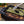 BioLite grill cooking chopped vegetables on a griddle with a metal spatula