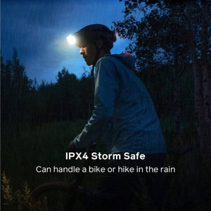 BioLite headlamp worn by a cyclist in the rain with IPX4 storm safe rating