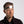 Person wearing a lit BioLite headlamp on their forehead