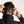 Person adjusting the reflective strap of a BioLite headlamp on their head