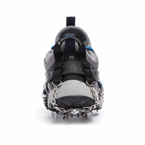 Rear view of a Black Diamond traction device attached to a grey trail running shoe