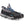 Black Diamond traction spikes attached to a grey hiking shoe