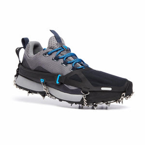 Black Diamond traction device attached to a grey and black running shoe