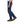 Side view of Black Diamond blue technical climbing pants with grey reinforced panels