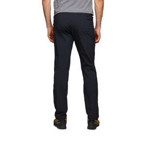 Back view of Black Diamond black hiking pants on a person