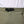 Black Diamond olive green pants with integrated black webbing belt and plastic buckle