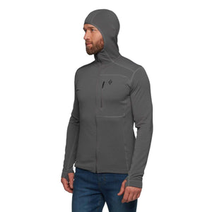 Man wearing a grey Black Diamond hooded zip up fleece with thumb holes