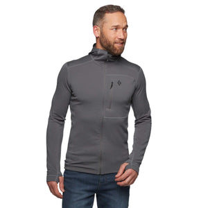 Man wearing a grey Black Diamond zip up hoodie with a chest pocket