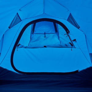Interior view of a blue Black Diamond tent with a zippered door and mesh ventilation panels