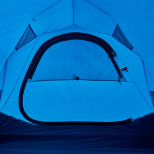 Interior view of a blue camping tent with a zippered door