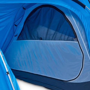 Interior view of a blue camping tent featuring a mesh window panel