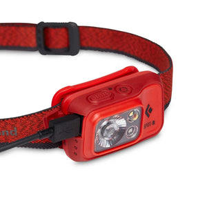 Black Diamond Spot-R headlamp in red with charging cable attached