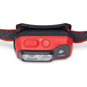 Black Diamond Storm headlamp with red casing and black strap