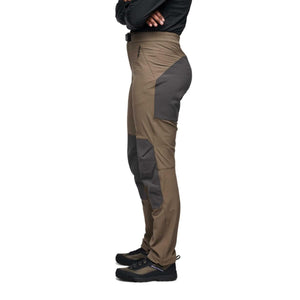 Side profile of Black Diamond hiking pants in olive green with dark grey reinforced knee and hip panels