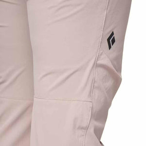 Light pink Black Diamond pants with logo detail