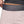 Black Diamond light pink shorts with a wide dark grey waistband
