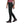 Side view of a person wearing Black Diamond black hiking pants and dark purple hiking shoes