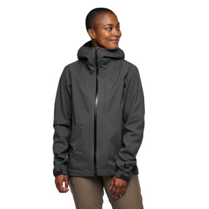 Person wearing a dark grey Black Diamond hooded shell jacket