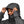 Person wearing a grey Black Diamond hooded jacket with the hood pulled up