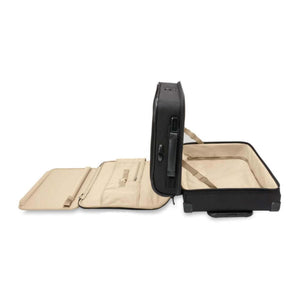 Briggs and Riley black carry on suitcase opened to show beige interior compartments