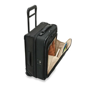 Briggs and Riley black rolling carry on suitcase with open front pocket showing interior organization