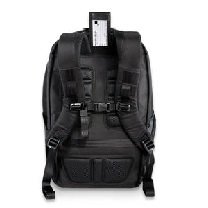 Back view of black Briggs and Riley backpack with padded shoulder straps and luggage tag