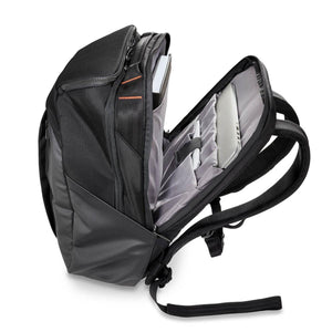 Open Briggs and Riley black backpack showing internal laptop and tablet compartments