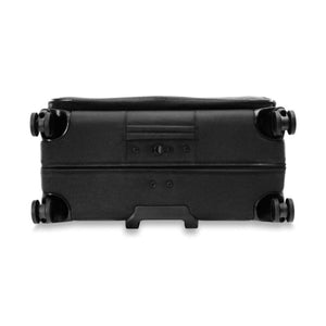 Bottom view of a black Briggs and Riley suitcase showing four wheels and a central handle