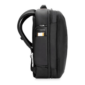 Side view of a black Briggs and Riley backpack with a side pocket and luggage tag
