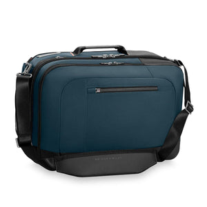 Blue Briggs and Riley travel bag with black accents and shoulder strap