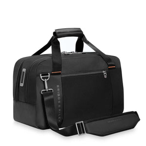 Black Briggs and Riley duffel bag with top handles and detachable shoulder strap