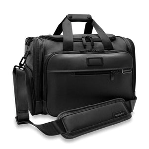 Black Briggs and Riley travel duffel bag with shoulder strap and top handles