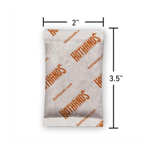 HotHands hand warmer packet with dimensions labeled as 2 inches by 3.5 inches