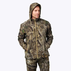 Man wearing a hooded camo hunting jacket with a front zipper