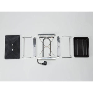 Snow Peak camping stove components laid out on a white surface