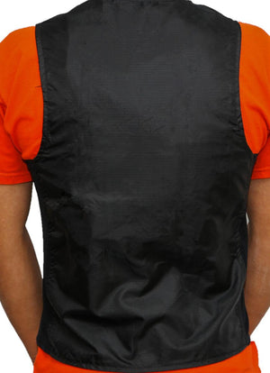 Back view of a black sleeveless vest worn over an orange shirt