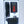 Spark black power bank with charging cable and wall adapter in white plastic packaging
